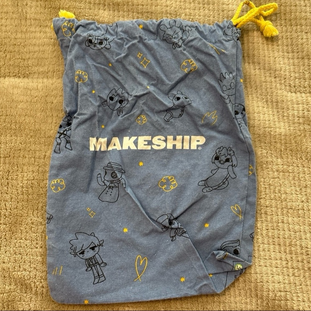Makeship Collectible Plush Blue Bag with Yellow Drawstrings